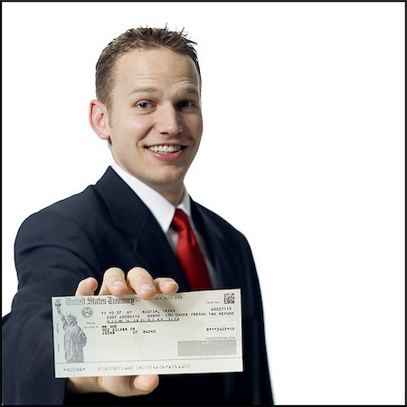 simsearch:640-03260699,k - Businessman holding US Treasury check Foto de stock - Sin royalties Premium, Código: 640-02771362