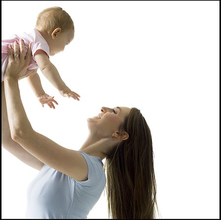 simsearch:640-02771500,k - Woman holding baby girl Foto de stock - Sin royalties Premium, Código: 640-02771379