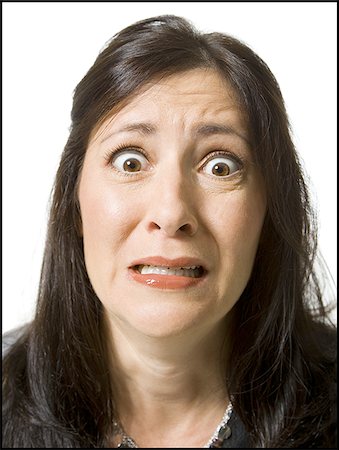 simsearch:640-02773811,k - Closeup of woman looking worried Stock Photo - Premium Royalty-Free, Code: 640-02771382