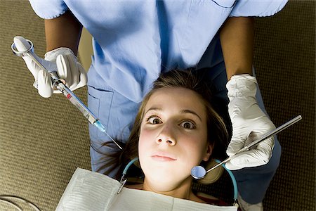 simsearch:640-02771776,k - Girl having dental examination Foto de stock - Royalty Free Premium, Número: 640-02771587