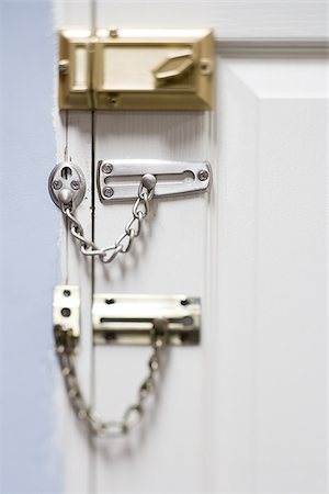 door with chain - Three locks on door Stock Photo - Premium Royalty-Free, Code: 640-02771660