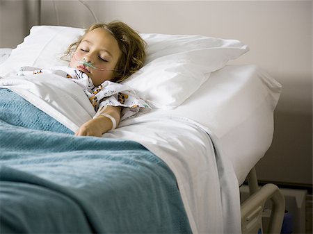 spirometer - Young girl in hospital bed with respirator Stock Photo - Premium Royalty-Free, Code: 640-02771746