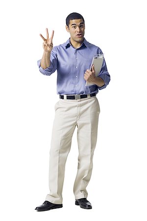 speakers, white background - Man standing with clipboard pointing Stock Photo - Premium Royalty-Free, Code: 640-02771868