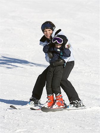 Woman and young girl skiing Stock Photo - Premium Royalty-Free, Code: 640-02772013