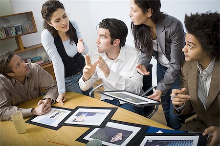 simsearch:640-01351279,k - People in business meeting in board room Stock Photo - Premium Royalty-Free, Code: 640-02772220