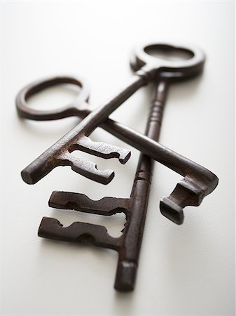 Detailed view of three skeleton keys Stock Photo - Premium Royalty-Free, Code: 640-02772366