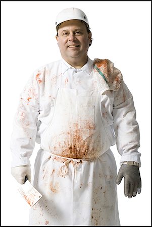 simsearch:640-02772428,k - Butcher standing with knife Foto de stock - Sin royalties Premium, Código: 640-02772412