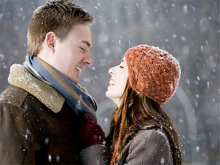 simsearch:640-02772458,k - Man and woman outdoors in winter smiling Stock Photo - Premium Royalty-Free, Code: 640-02772456