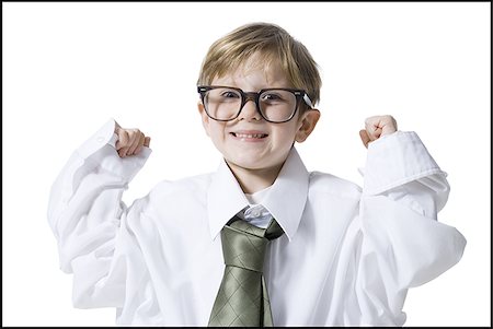 Little boy dressed as business executive Stock Photo - Premium Royalty-Free, Code: 640-02772502