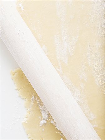 simsearch:640-02772561,k - Detailed view of dough with rolling pin Stock Photo - Premium Royalty-Free, Code: 640-02772550