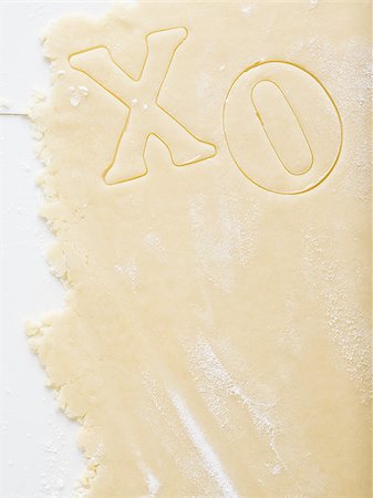 simsearch:640-02772561,k - Detailed view of dough with X and O Stock Photo - Premium Royalty-Free, Code: 640-02772564