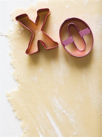 simsearch:640-02772561,k - Detailed view of dough with X and O Stock Photo - Premium Royalty-Free, Code: 640-02772565