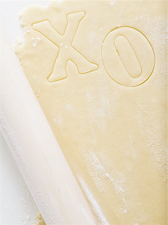 simsearch:640-02772561,k - Detailed view of dough with X and O Stock Photo - Premium Royalty-Free, Code: 640-02772566
