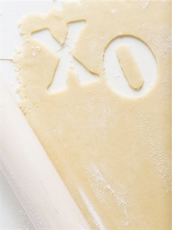 simsearch:640-02772561,k - Detailed view of dough with X and O Stock Photo - Premium Royalty-Free, Code: 640-02772562