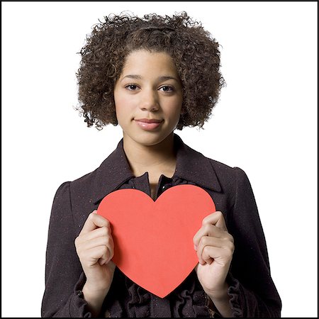 Girl with red heart Stock Photo - Premium Royalty-Free, Code: 640-02772637