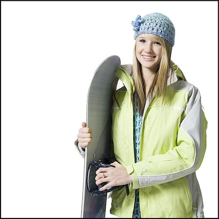 simsearch:640-01353835,k - Girl with winter hat and skis smiling Stock Photo - Premium Royalty-Free, Code: 640-02772917