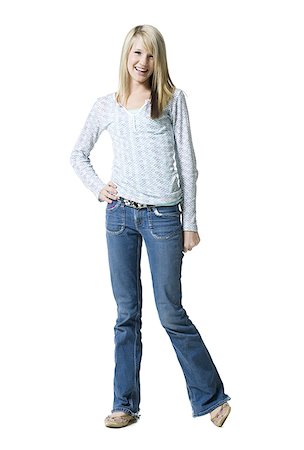 silhouette of teenage girl - Teenage girl smiling and posing Stock Photo - Premium Royalty-Free, Code: 640-02772912