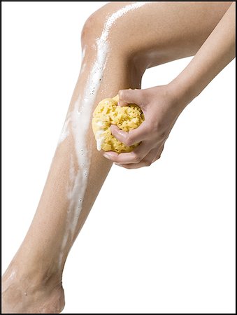 sponge bath woman - woman washing legs Stock Photo - Premium Royalty-Free, Code: 640-02773009