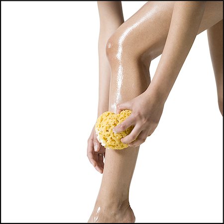 sponge bath woman - woman washing legs Stock Photo - Premium Royalty-Free, Code: 640-02773010