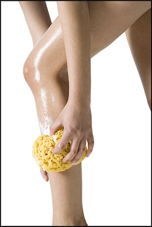 sponge bath woman - woman washing legs Stock Photo - Premium Royalty-Free, Code: 640-02773011