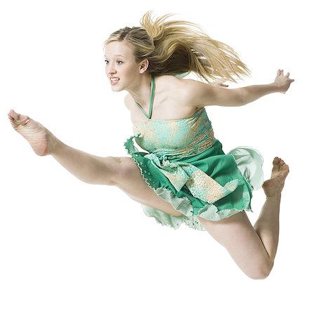 Ballerina dancing and smiling Stock Photo - Premium Royalty-Free, Code: 640-02773076