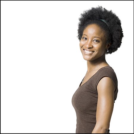 portrait and woman and closeup and arms - Portrait of a woman smiling Stock Photo - Premium Royalty-Free, Code: 640-02773127