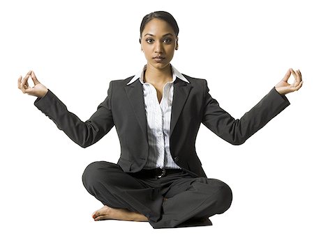 simsearch:640-03261348,k - Femme d'affaires assis les jambes faisant du yoga Photographie de stock - Premium Libres de Droits, Code: 640-02773265