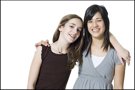 simsearch:640-01601334,k - Two girls hugging and laughing Stock Photo - Premium Royalty-Free, Code: 640-02773298