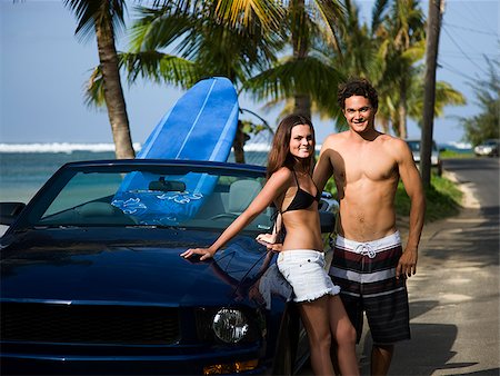 simsearch:640-02947668,k - couple going to the beach to surf Stock Photo - Premium Royalty-Free, Code: 640-02947733
