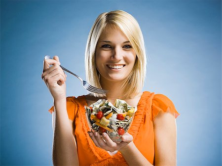 simsearch:640-02949943,k - woman eating a salad made of money Stock Photo - Premium Royalty-Free, Code: 640-02947862