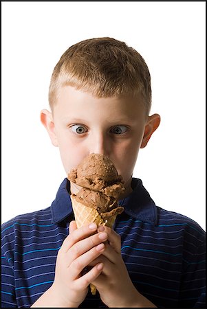 excited ice cream - boy holding an ice cream cone Stock Photo - Premium Royalty-Free, Code: 640-02948001