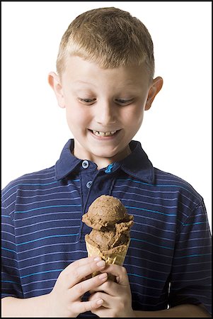 excited ice cream - boy holding an ice cream cone Stock Photo - Premium Royalty-Free, Code: 640-02948002