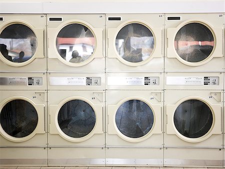 dryers in a laundromat Fotografie stock - Premium Royalty-Free, Codice: 640-02948226