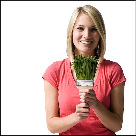 simsearch:640-02948353,k - woman with a paint brush made of grass Foto de stock - Royalty Free Premium, Número: 640-02948311