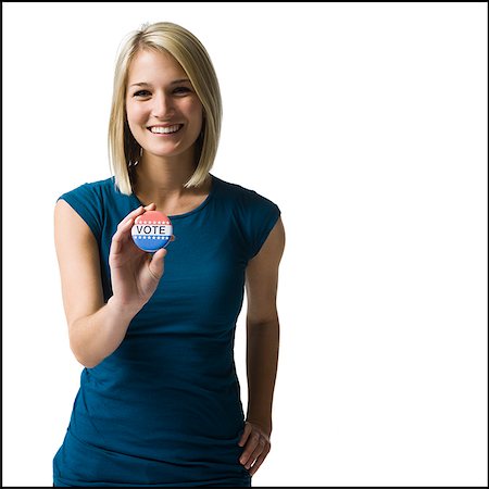 woman with a "vote" button Foto de stock - Sin royalties Premium, Código: 640-02948346