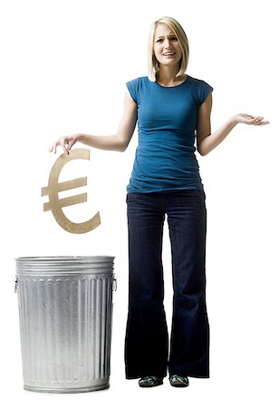 simsearch:640-02948353,k - woman throwing euro symbol in the trash Foto de stock - Royalty Free Premium, Número: 640-02948358