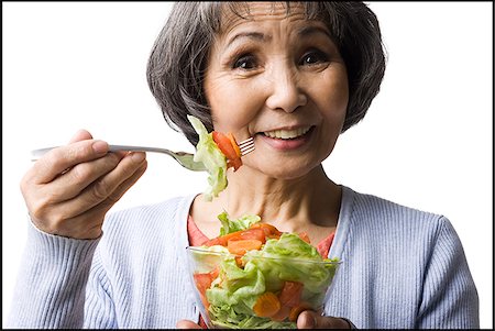 simsearch:640-02949943,k - senior woman eating salad Stock Photo - Premium Royalty-Free, Code: 640-02948505