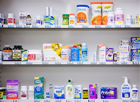 prescription - bottles on the shelves at a pharmacy Stock Photo - Premium Royalty-Free, Code: 640-02948506