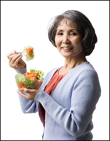 simsearch:640-02949943,k - senior woman eating salad Stock Photo - Premium Royalty-Free, Code: 640-02948509