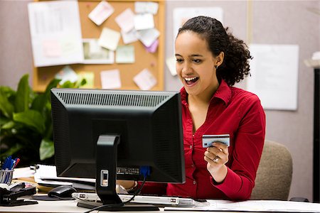 dominicana - woman making an online purchase Foto de stock - Sin royalties Premium, Código: 640-02948827