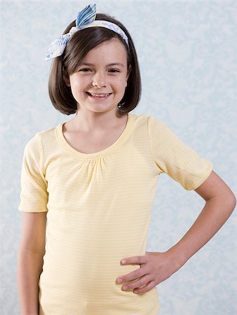 girl with hand on hip Stock Photo - Premium Royalty-Free, Code: 640-02948871