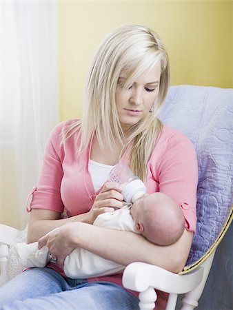 feeding a new born baby - mother and newborn baby Stock Photo - Premium Royalty-Free, Code: 640-02948945
