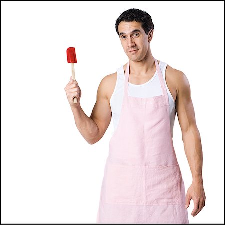 spatula - man in an apron with a spatula Stock Photo - Premium Royalty-Free, Code: 640-02949086