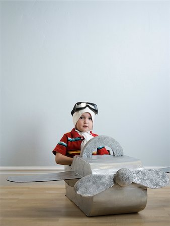 little boy playing dress up Foto de stock - Sin royalties Premium, Código: 640-02949154