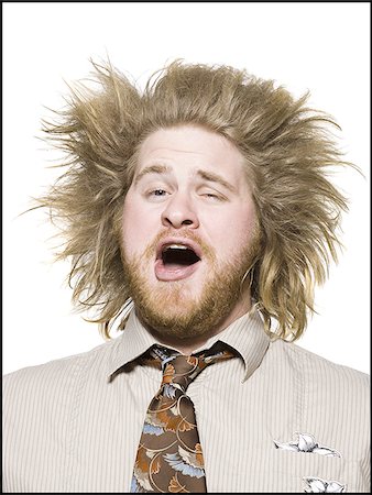 surprised people white background - man with wild hair Stock Photo - Premium Royalty-Free, Code: 640-02949227