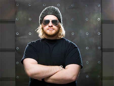 man wearing a beanie and sunglasses Stock Photo - Premium Royalty-Free, Code: 640-02949259