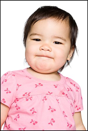 simsearch:640-02949616,k - baby in a pink shirt Foto de stock - Royalty Free Premium, Número: 640-02949599