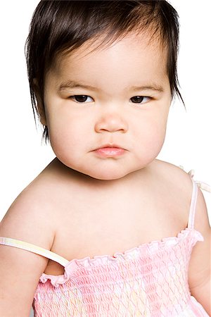 simsearch:640-02949616,k - baby girl in a pink dress Foto de stock - Royalty Free Premium, Número: 640-02949605