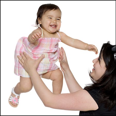 simsearch:640-02949616,k - baby girl in a pink dress Foto de stock - Royalty Free Premium, Número: 640-02949619