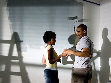 ruban-cache - couple de peindre une pièce Photographie de stock - Premium Libres de Droits, Code: 640-02949865